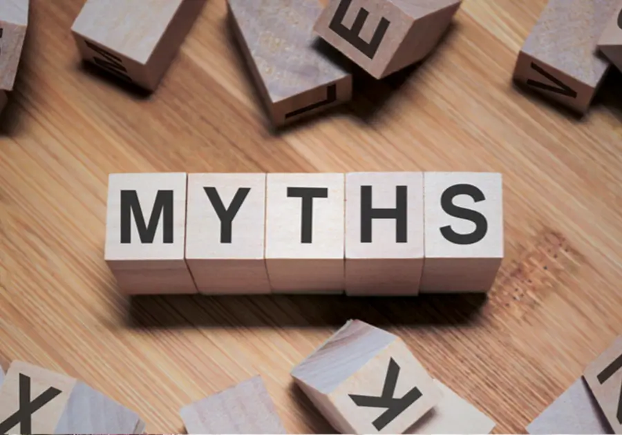 image featuring wooden blocks spelling out 'MYTHS' surrounded by discarded blocks and letters, visually representing the concept of debunking common misconceptions about boundaries.